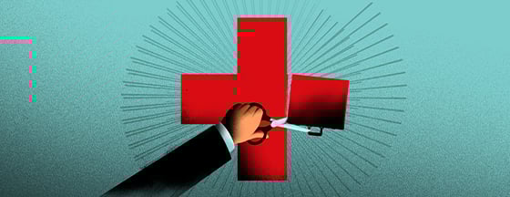 Image of medical red cross being cut