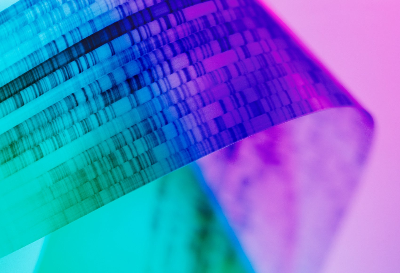 A medical instrument behind a blue to purple gradient